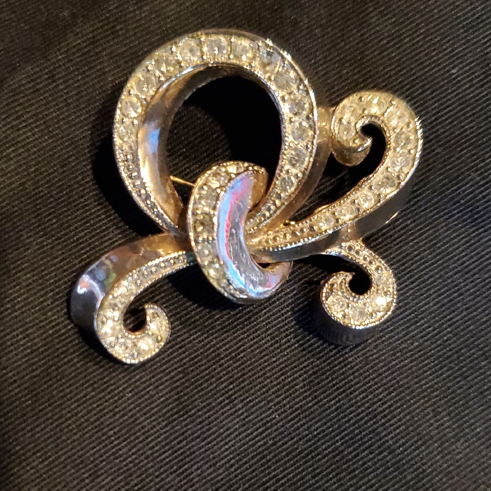 Elegant Gold and Silver Swirl Brooch